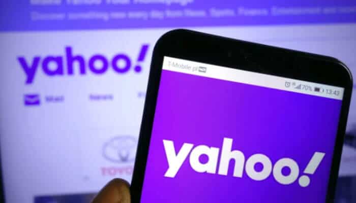 Smartphone screen showing Yahoo interface, representing how to Open Yahoo Mail Photos easily