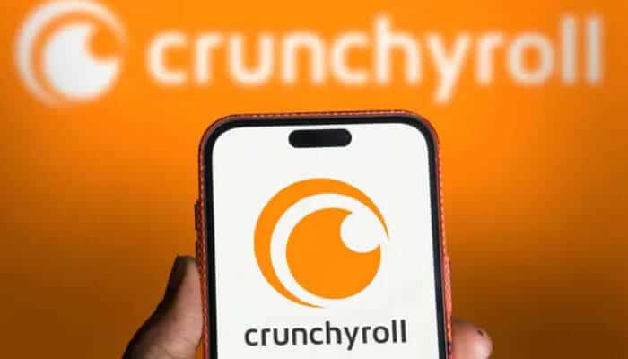 Phone displaying the Crunchyroll logo, illustrating how to activate Crunchyroll on your device
