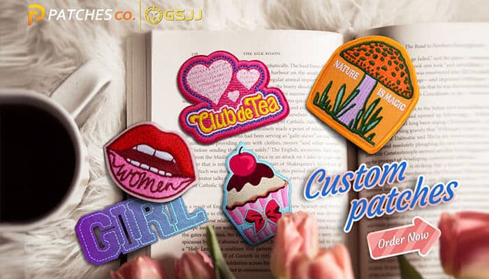 Colorful custom patches displayed on an open book with flowers, resembling creative designs like the Google memory game.