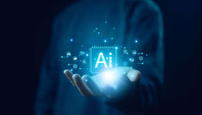 Hand holding a glowing AI chip with digital icons representing AI management strategies and futuristic technology.