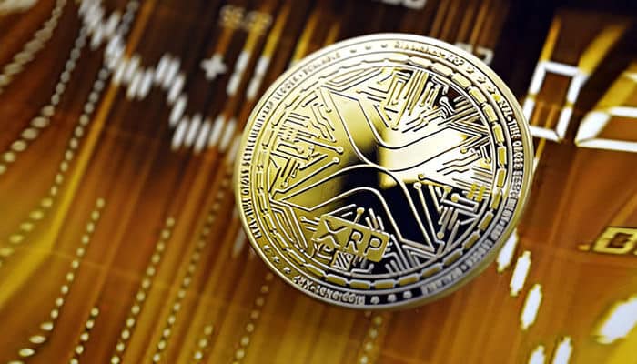 Close-up of a golden XRP coin placed on a digital financial chart, symbolizing cryptocurrency growth and investment opportunities in the XRP passive income plan.