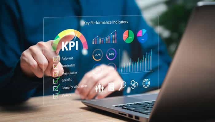 Dashboard showing KPIs and performance metrics on a digital screen, representing data monitoring and analytics essential for a Lean Fintech Stack.