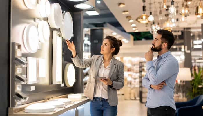 Conversion Optimization for LED Lighting Leads - Startupeditor | Startup Editor SEO for LED Lighting Company visual showing customers exploring LED lighting products in a showroom.